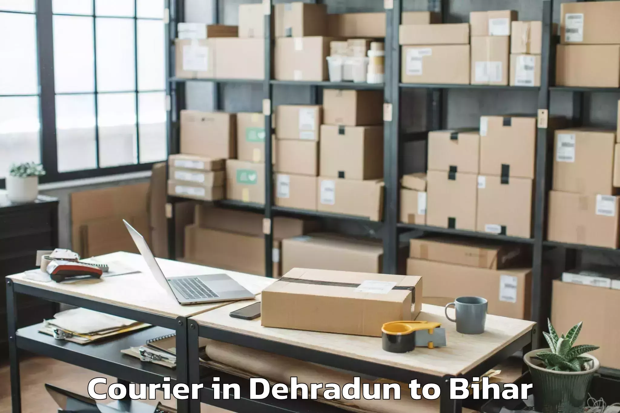 Book Dehradun to Majhaulia Courier Online